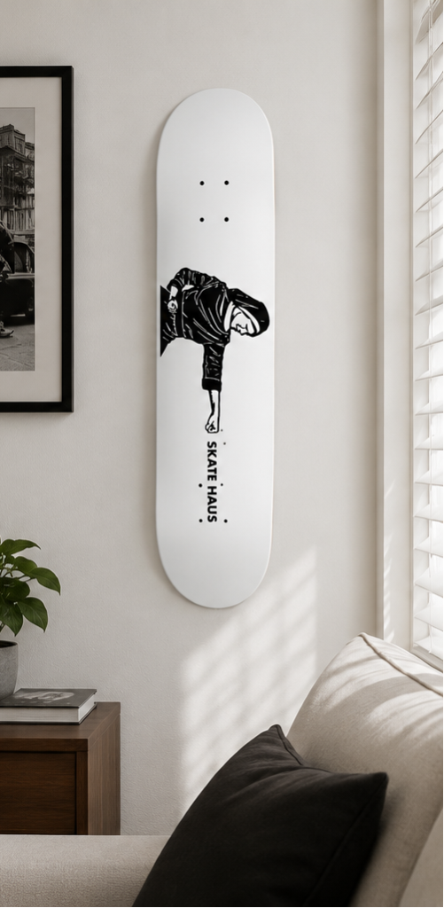 NunFu Skate Haus deck hanging in living room 
